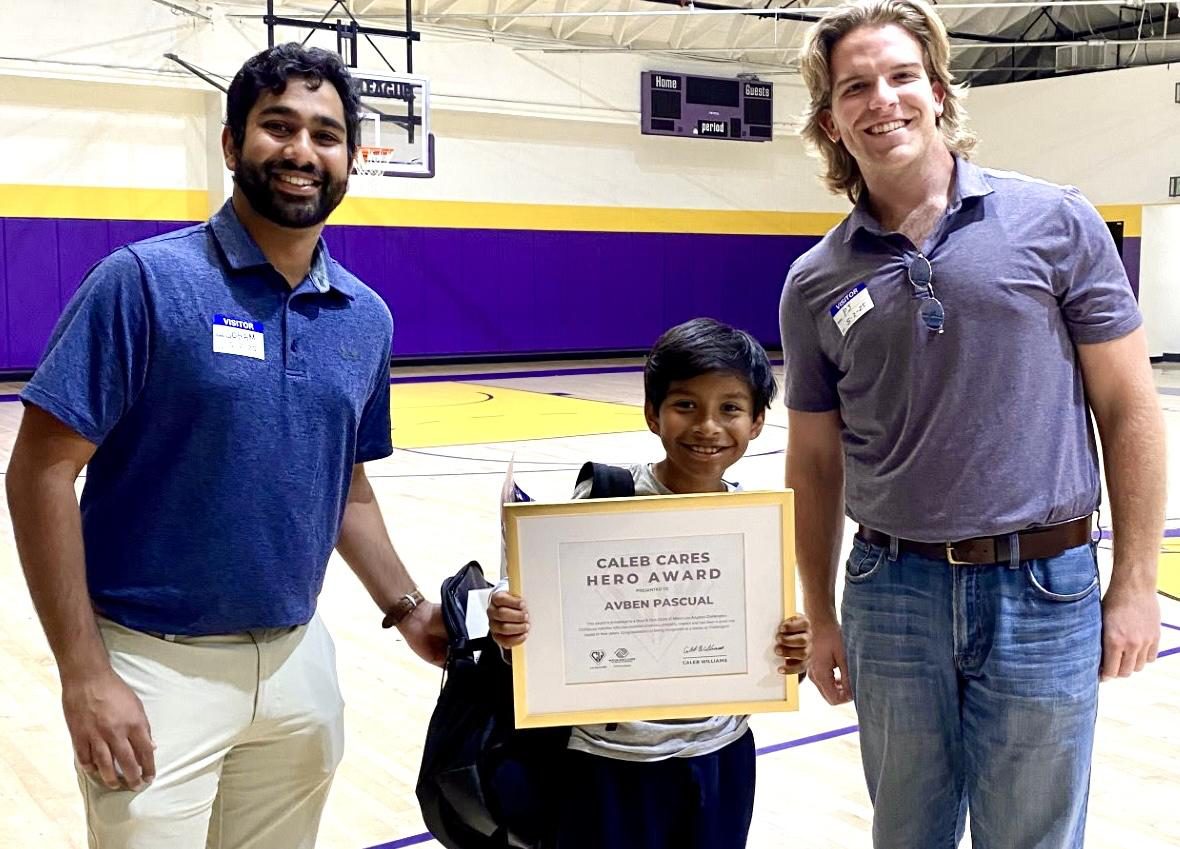 Los Angeles volunteers presenting the Caleb Cares Hero Award to Avben Pascual