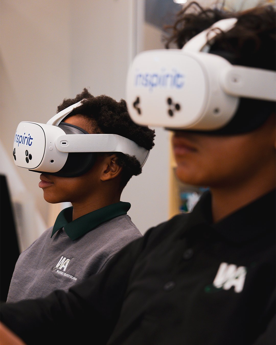 Students using Inspirit VR headsets